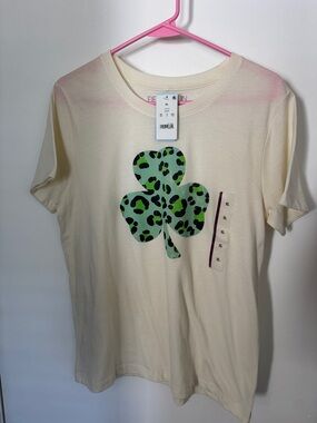 Fifth Sun Cream Tee with Green Leopard Clover Graphic